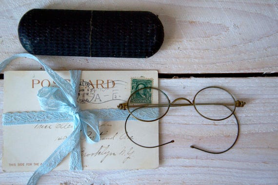 Antique round eyeglasses with case, Round eyeglass