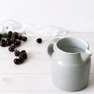 Rustic vintage jug vase for cottage interiors or pottery collections