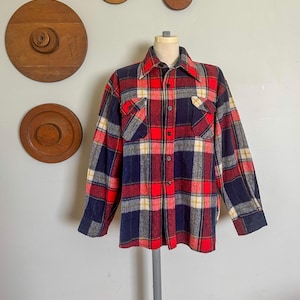 May include: A set of three ceramic mugs with a speckled, matte finish. The mugs are in shades of cream, light gray, and dark gray. Each mug has a simple, minimalist design, perfect for coffee or tea.