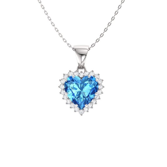 Blue Topaz and Diamond Halo - Etsy 