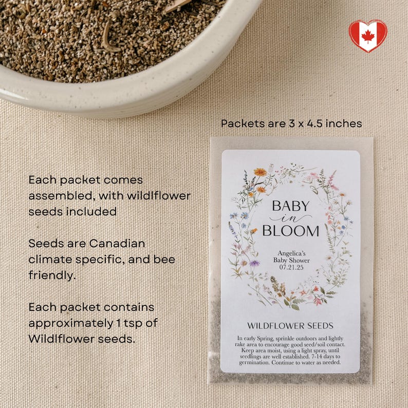 May include: A white envelope with a floral design and the text "Baby in Bloom" on the front. The envelope contains wildflower seeds and instructions for planting. The envelope is 3 x 4.5 inches.