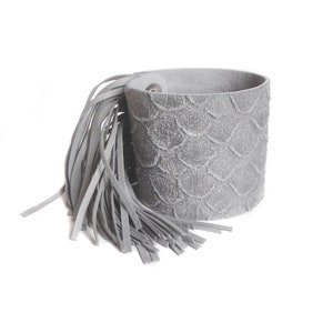 May include: Gray leather bracelet with a fringe tassel. The bracelet has a textured, scaly design.