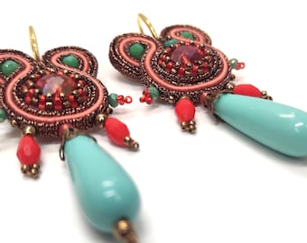 Soutache earrings in copper and orange tone with turquoise colored glass elements