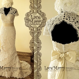 May include: A white lace wedding dress with a fitted bodice, a V-neckline, and a flowing skirt. The dress has short sleeves and a keyhole back. The dress is accented with a satin sash and a bow at the back.