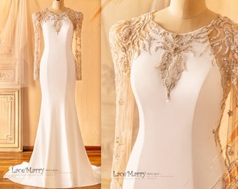 ANZU / Dopasowana suknia ślubna: Suknia z satyny w kolorze kości słoniowej z aplikacjami z koralików