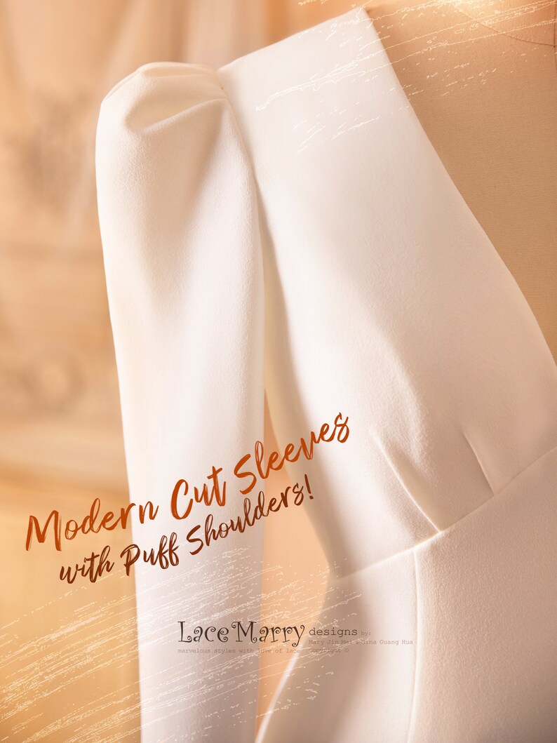 May include: A white dress with a modern cut sleeve design and puff shoulders. The text "Modern Cut Sleeves with Puff Shoulders!" and "Lace Marry designs" is visible on the dress.