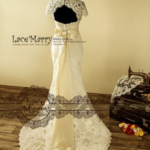 Dainty Cream Color Underlay Lace Wedding Dress with Keyhole Back and Cap Sleeves Featuring Long Taffeta Sash and Asymmetric Scalloped Detail image 9