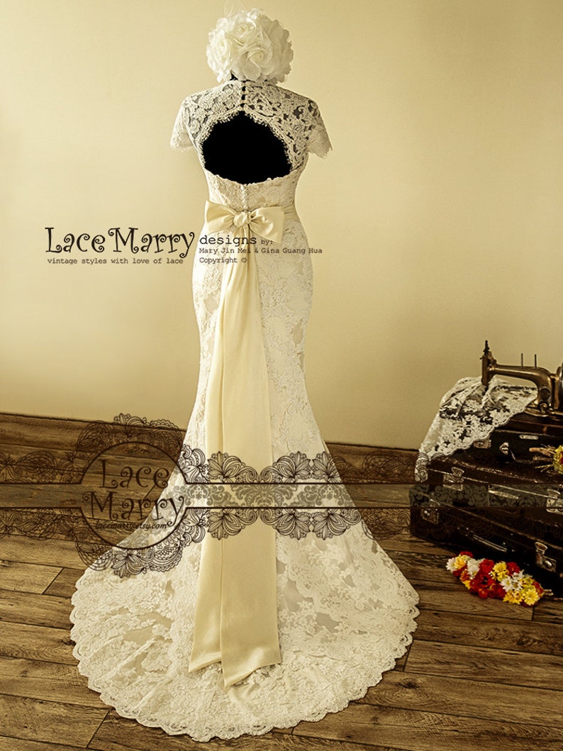 Dainty Cream Color Underlay Lace Wedding Dress with Keyhole Back and Cap Sleeves Featuring Long Taffeta Sash and Asymmetric Scalloped Detail image 9