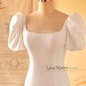 MADIA / Plain Wedding Dress with Modest Neckline and Sexy Open Back, Puff Sleeves Wedding Dress in Fit and Flare Cut with Train