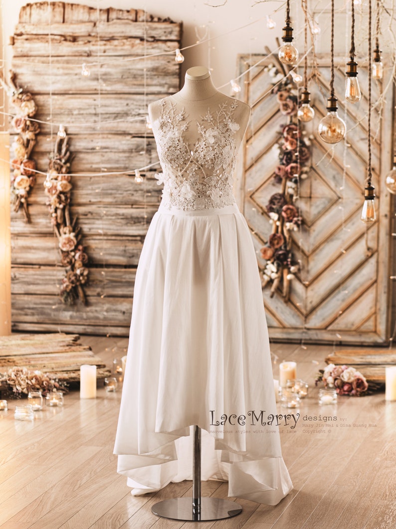 Two Piece Wedding Dress Set from Lightly Beaded Transparent Crop Top with 3D Flower Applique and Ample High Low Skirt in Folded Modern Cut Lace Top + Skirt