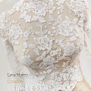 May include: A white lace top with long sleeves and a high neckline, displayed on a mannequin. The intricate floral lace design is visible, with the words "Lace Marry designs" and "CALLISTA" in the image.
