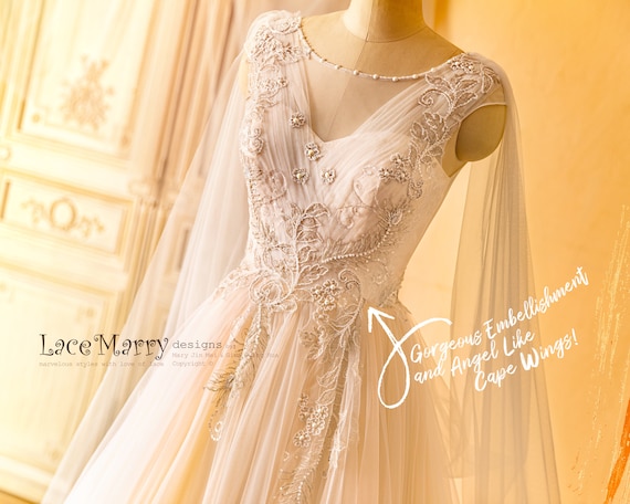 SAFFI Fairytale Design Wedding Dress with Angel Like Cape Wings and Gorgeous Hand Beading A Line Wedding Dress with Tulle Cape Wings
