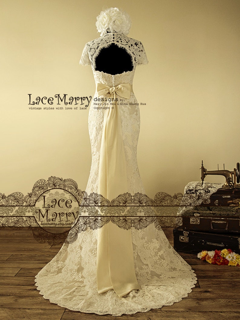 Dainty Cream Color Underlay Lace Wedding Dress with Keyhole Back and Cap Sleeves Featuring Long Taffeta Sash and Asymmetric Scalloped Detail image 6