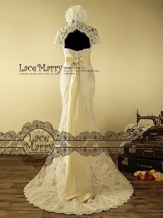 Lace wedding dress with cap sleeves and keyhole back sales