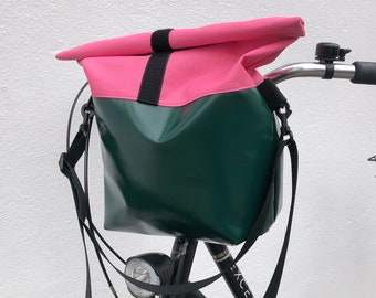 Large, waterproof handlebar bag with removable, adjustable strap