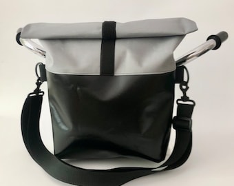 Large, waterproof handlebar bag with removable, adjustable strap