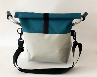 Large, waterproof handlebar bag with removable, adjustable strap