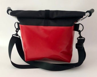 Large, waterproof handlebar bag with removable, adjustable strap