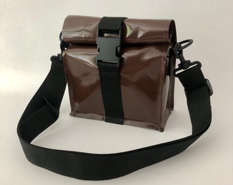 Roll-up shoulder bag with buckle, brown
