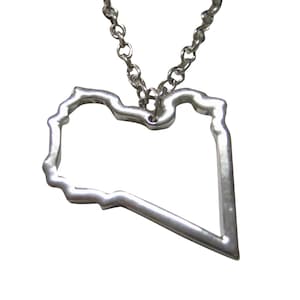 May include: A silver necklace with a pendant shaped like the outline of the country of Libya.