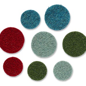 May include: Assortment of eight felt circles in various colours, including red, green, blue, and grey. The circles are arranged in a circular pattern on a white background.
