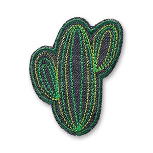 May include: A cactus-shaped embroidered patch featuring a dark denim fabric base with bright green stitched vertical lines and a thick dark green border outlining the entire shape of the plant with two side arms extending from the main body.