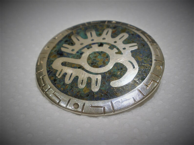 Vintage Sterling BroochPendant Made in Taxco Mexico Silver Assay Mark Round Aztec Design Quality Made Collectible Gift Item