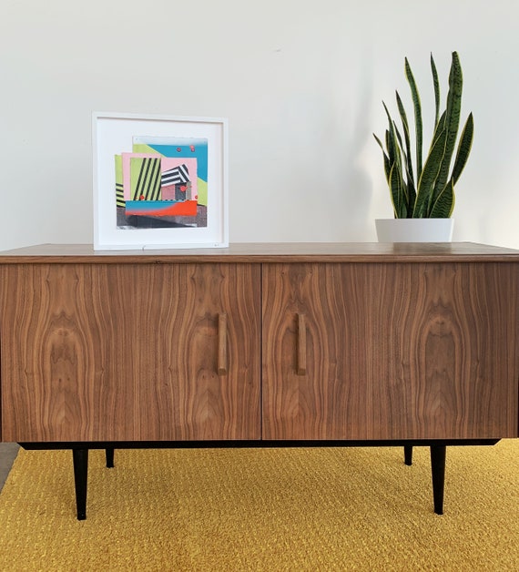 Credenza with record sale storage