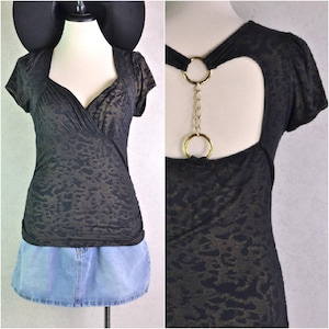 Women's Vintage Y2K Black and Metallic Gold Animal Print Plunge V Neck Open Back Chain Hardware Embellished Short Sleeve Top by Arden B // M