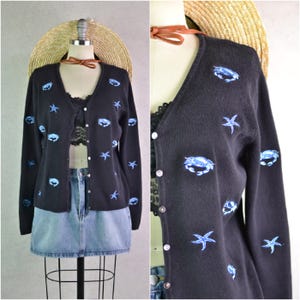 Women's Vintage Y2K Mercer & Madison Black and Blue Cotton Embroidered Crab and Starfish All Over Novelty Button Down Cardigan Sweater S