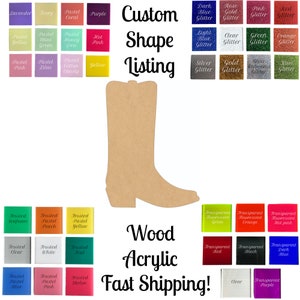 May include: A wooden cutout of a cowboy boot in the shape of a boot. The boot is brown and has a pointed toe. The image also shows a variety of colors and finishes for the boot, including wood, acrylic, and glitter.