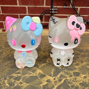 Kitty Selenite carvings, cartoon carvings, crystals.