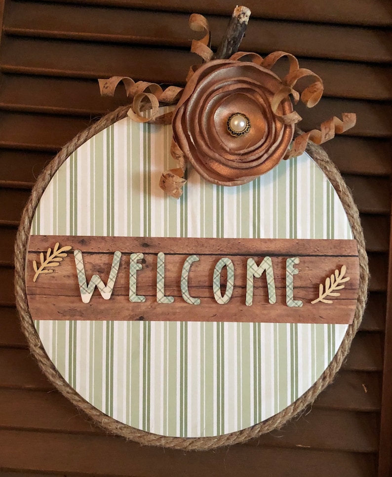 Mint green multi stripe Fall Welcome pumpkin sign if you have a metal door it can be hung w magnets. Super lightweight