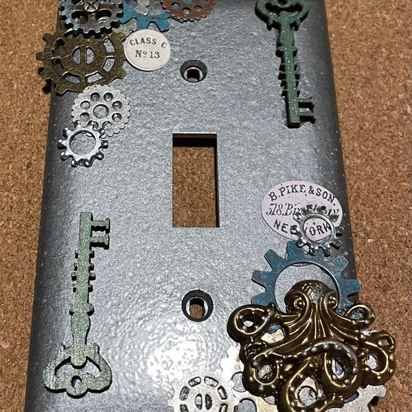 Gun metal Industrial / Steampunk Single switch cover is handcrafted made from assorted recycled material. please read description.