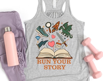 May include: A gray racerback tank top with the text "RUN YOUR STORY" and various graphics, including a shoe, rocket, dragon, and sword. A pink water bottle, purple leggings, and pink dumbbells are also in the image.