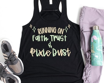 May include: Black racerback tank top with the text "RUNNING ON Faith, Trust & Pixie Dust" in pastel colors. The image also includes gray athletic shoes, lavender leggings, and a floral water bottle.