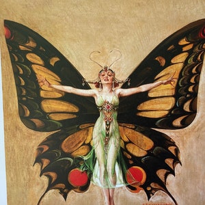 May include: A vintage illustration of a woman with butterfly wings. She is wearing a green dress and a crown. The wings are black and yellow with red accents. The background is a light brown.