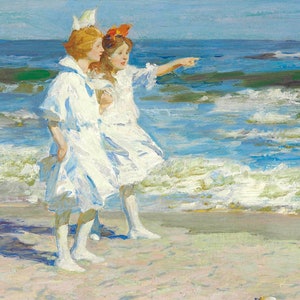 May include: Two girls in white dresses stand on a sandy beach, looking out at the ocean. The girl in the front is pointing at something in the distance. The sky is blue and the water is a light blue with white waves.
