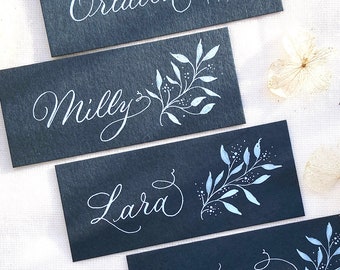 Slate blue-grey wedding place names with hand calligraphy, made in the UK from sustainable card