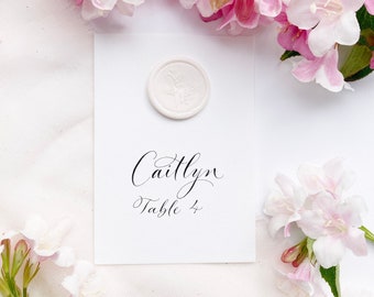 Luxe white wedding place names with calligraphy will also work as escort cards / place cards / personalised name cards for weddings