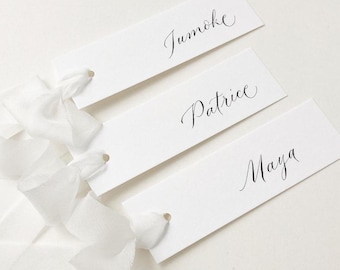 Delicate White Wedding Place Cards with Calligraphy