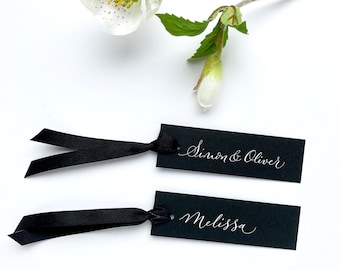 Black slimline sustainable wedding place names with optional ribbon