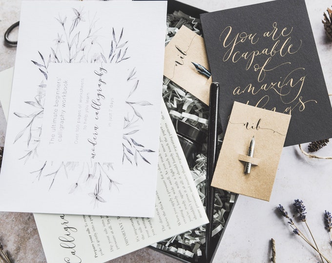 Featured listing image: The ULTIMATE modern calligraphy kit! Learn modern calligraphy in just 7 days with 100+ pages of PRINTABLE worksheets when you buy this kit