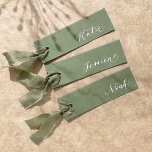 Elegant sage green wedding place names image 3