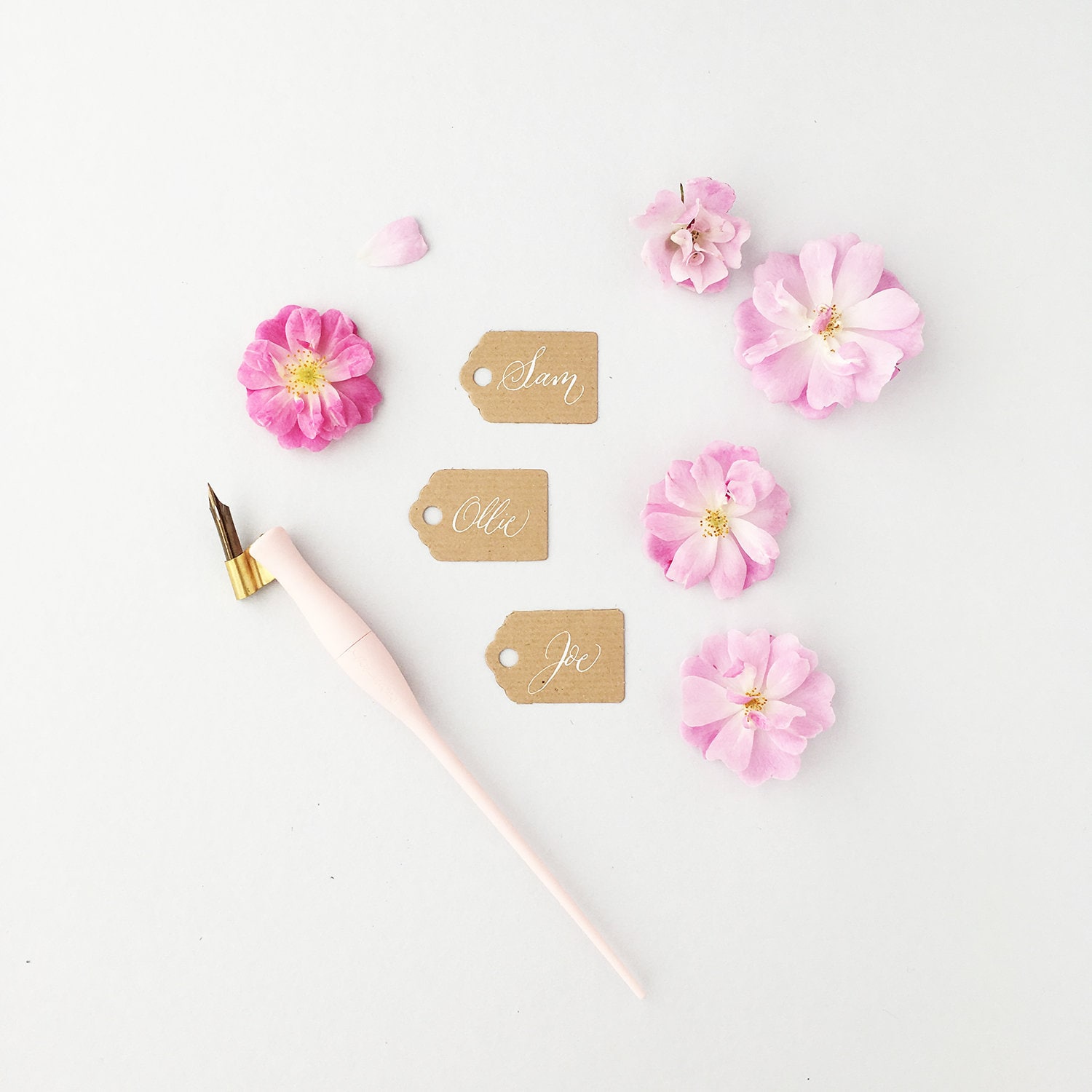 tiny rustic luggage tags with white calligraphy wedding place