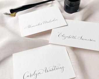 Luxury wedding place cards with calligraphy written by hand