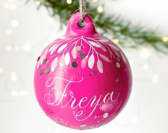 Pink personalised name bauble with handwritten calligraphy
