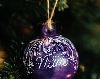 Rich purple calligraphy name bauble