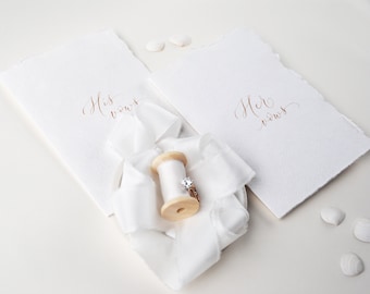 Personalised wedding vow booklets with handwritten calligraphy and torn edge covers, sustainable and ethically produced