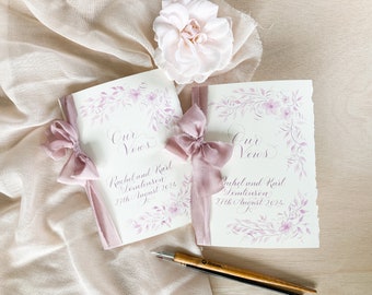 Wedding vow booklets with calligraphy covers and blank inserts